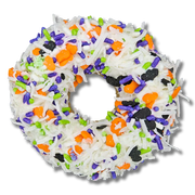 Halloween-themed dog treat with colorful sprinkles